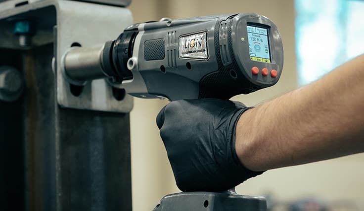 The LION GUN Dual Speed Electric Torque Tool in use on an application.